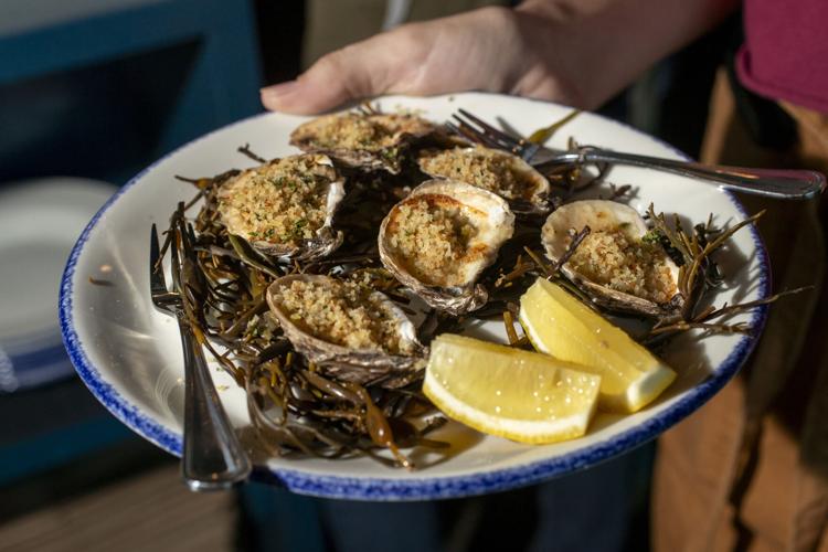 The Archer signature dishes Wreckfish, Baked Oysters, Braised Short Rib, Duck Frites, Spiced Chilled Shrimp, Burrata
